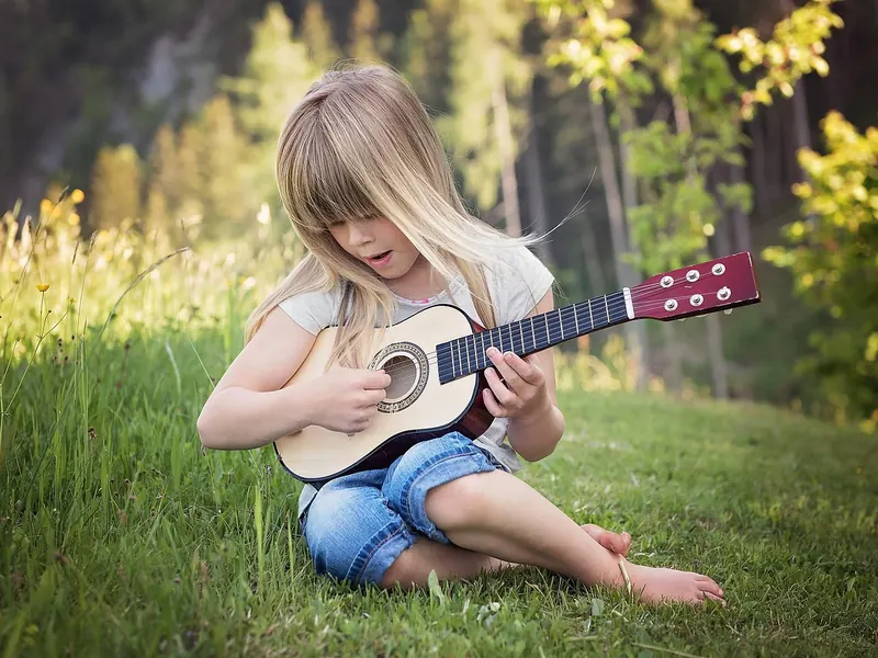 A starter guitar or ukulele