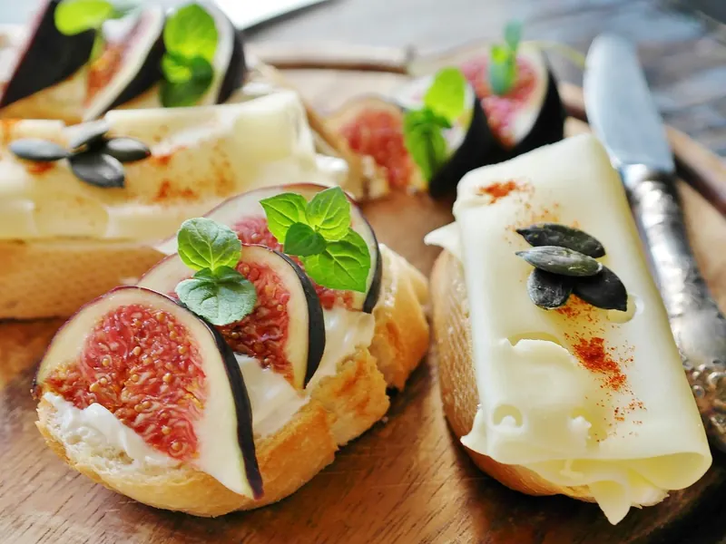 A cheese board and knife set