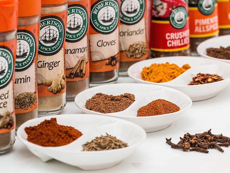 A set of whole spices in jars