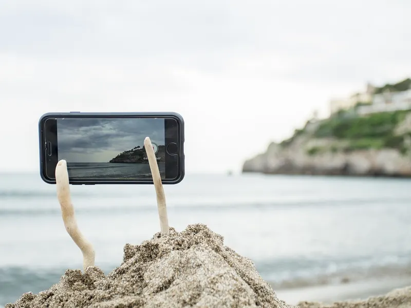 A flexible phone tripod